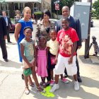 Mayor Rawlings-Blake and school children pose with a Safe Route to School footprint